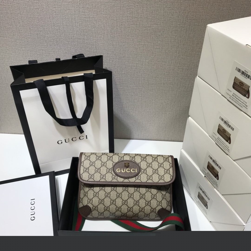 G*u*i clutch bags